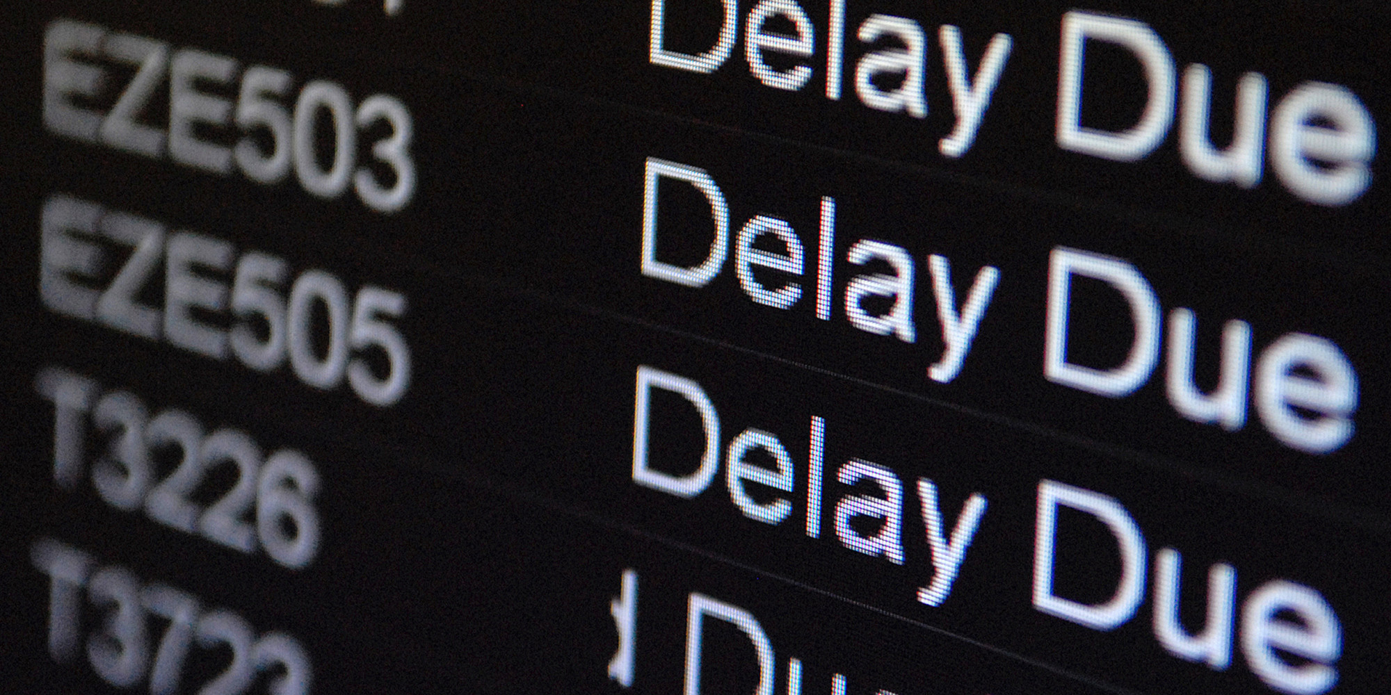 An electronic flight departures board sh