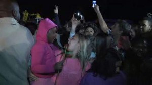 People outside Mandela's home singing in his honour