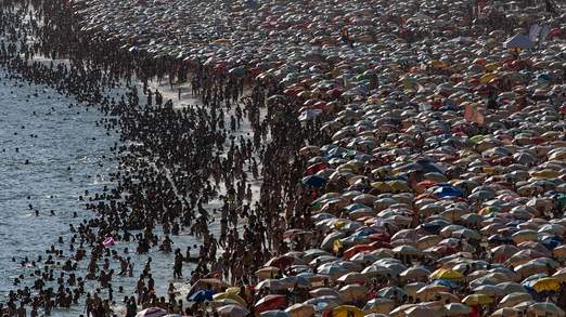 People enjoy Ipanema beach in Rio de Janeiro during a heatwave in Brazil