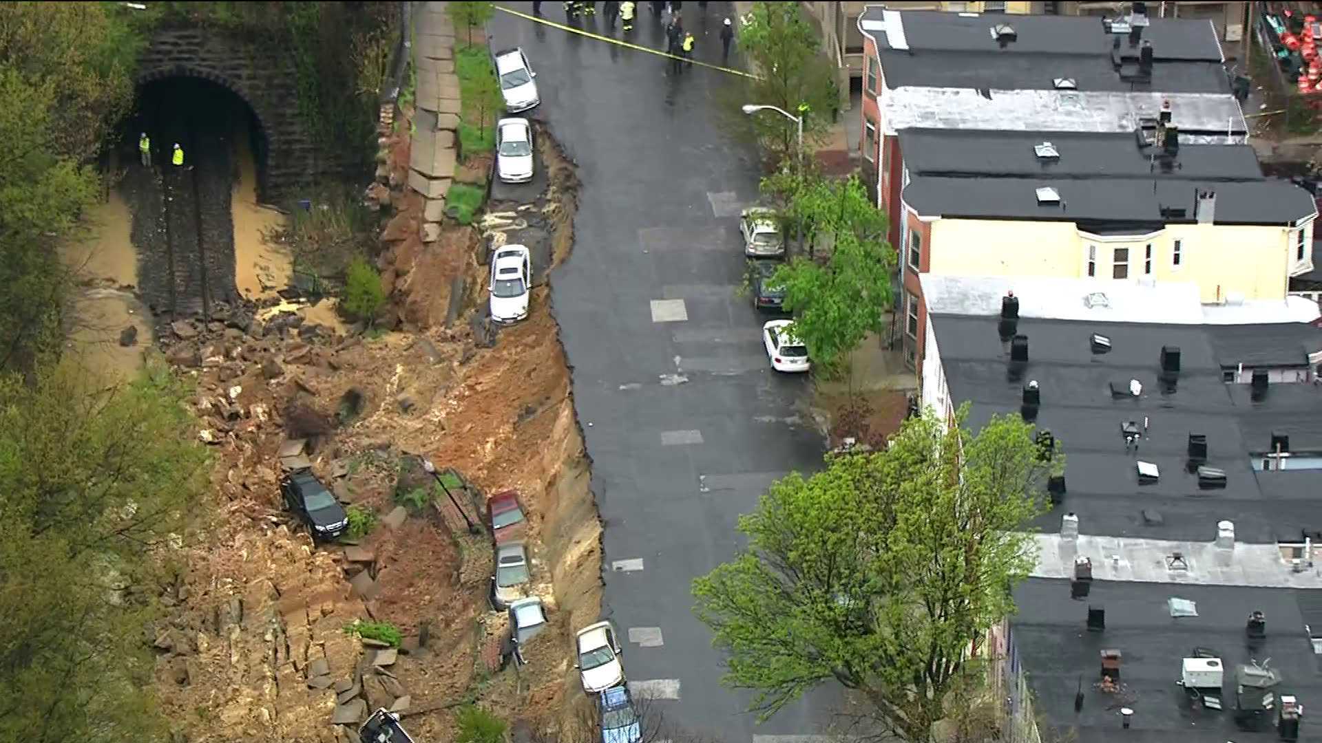 Landslide Swallow Cars In Street In Baltimore