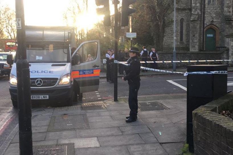 Police presence Officers placing a cordon at the scene in Islington