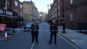 Police officers at the scene on Saturday. Pic: PA
