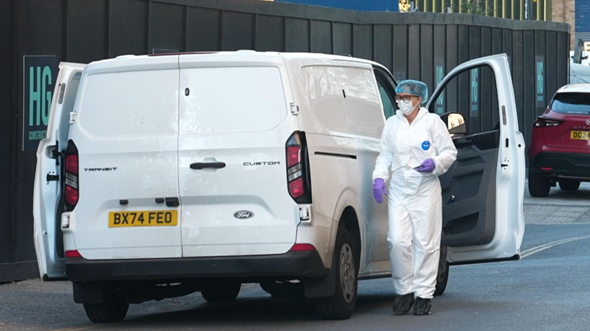 Forensics officers at the scene on Ruby Street in Peckham