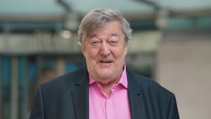 Sir Stephen Fry launches £100k damages claim after breaking multiple bones in fall at O2