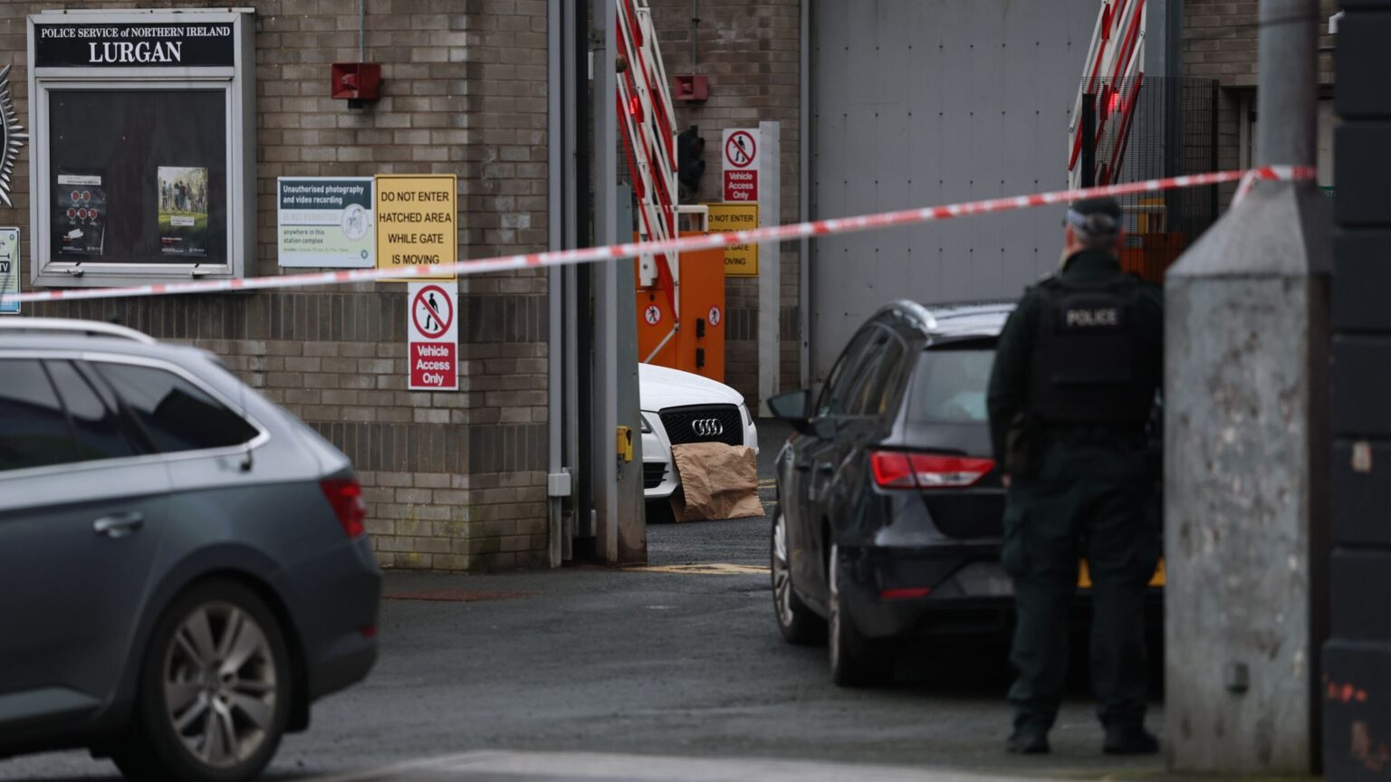 A white Audi car parked next to the police station in Lurgan. Pic: PA
