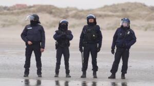 skynewsfrancepolicesmallboats7227816 Access to London French authorities on the beach in Gravelines France where migrants are boarding small boats in an attempt to cross the Channel Pic PA