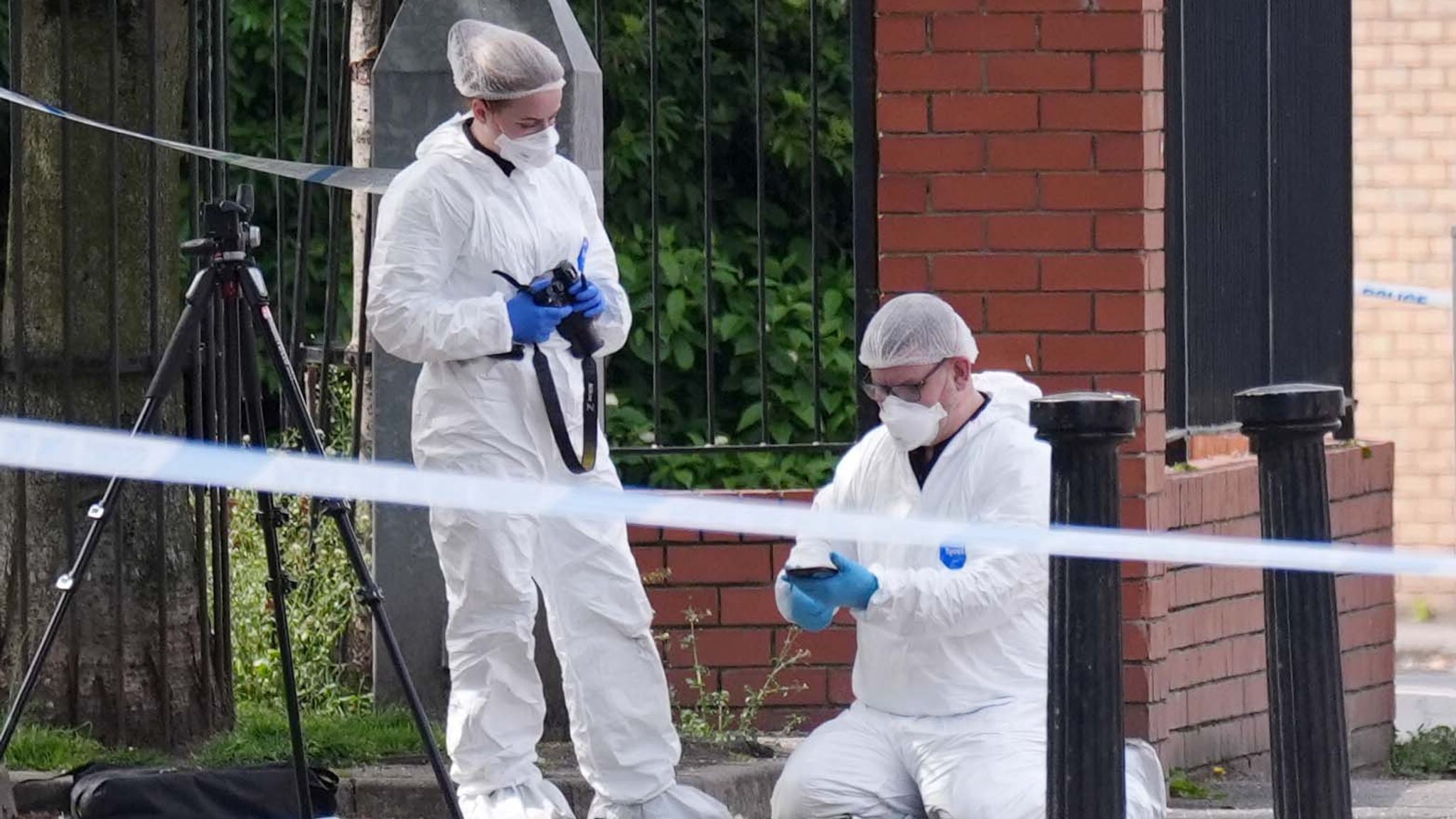 Forensics officers collecting evidence. Pic: PA
