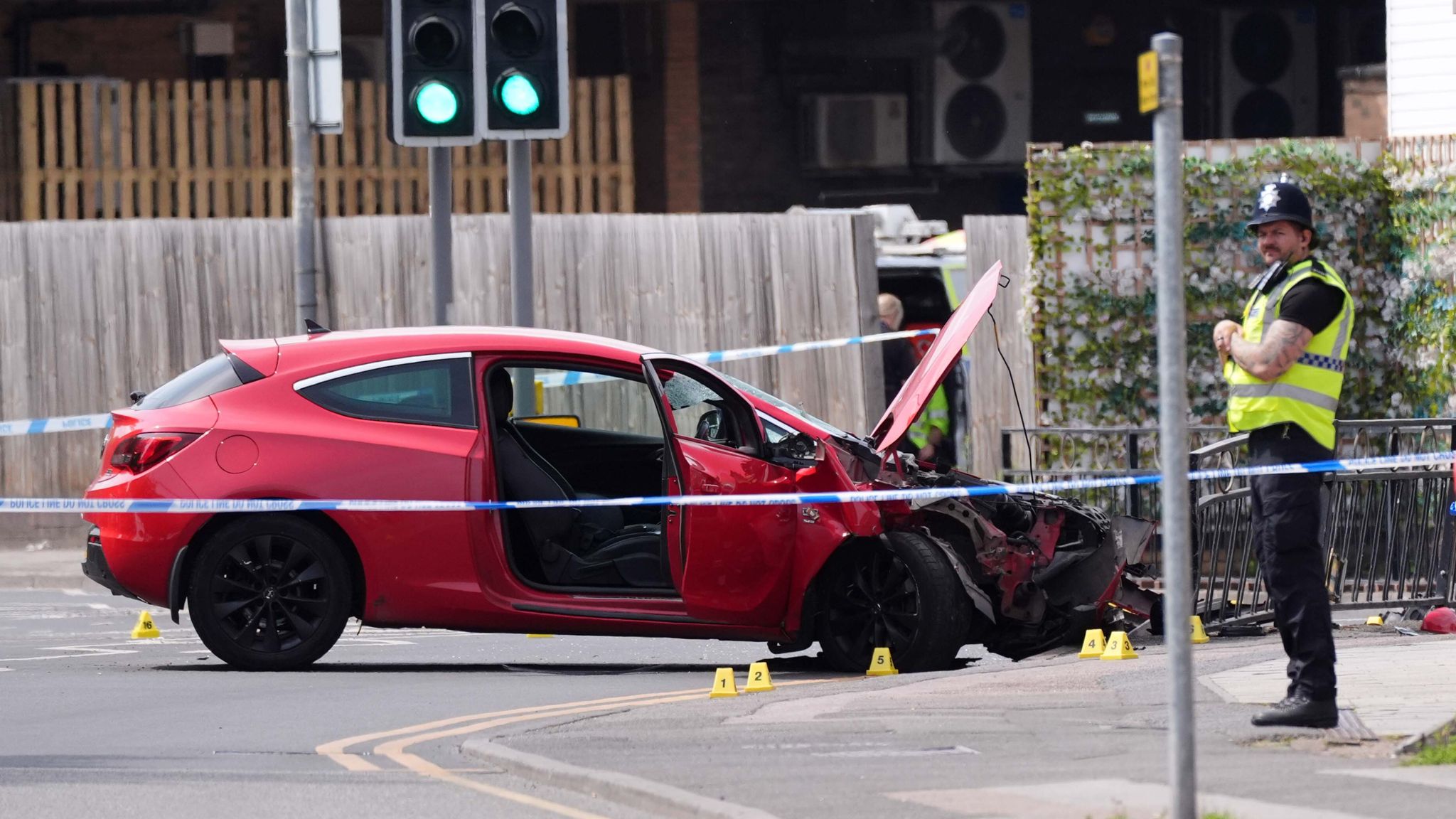 Man arrested on suspicion of attempted murder after five injured when car hit pedestrians