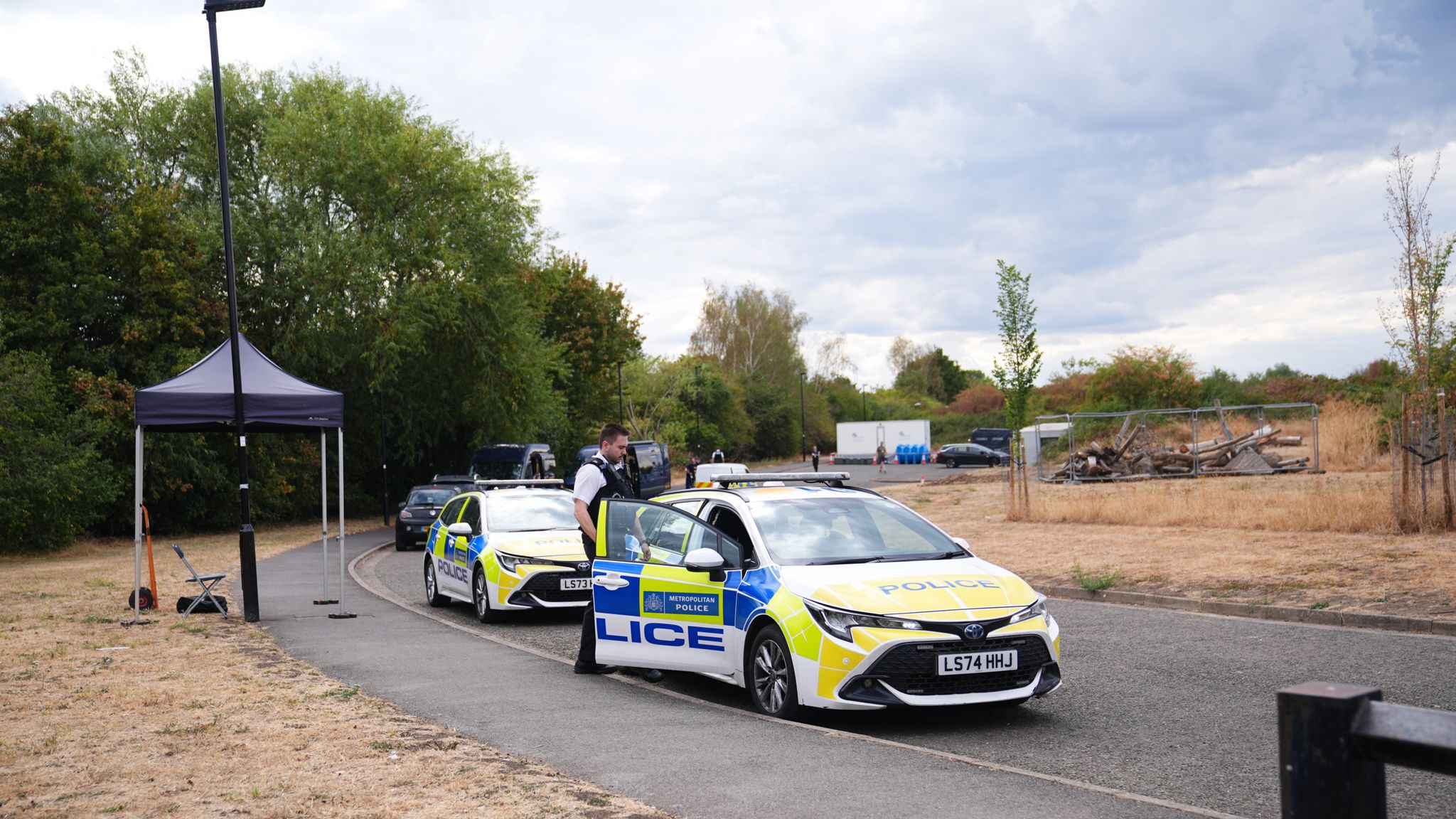 Police were parked near the scene on Friday. Pic: PA