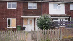 Protesters criticised by police for trying to kick down doors of properties believed to house asylum seekers