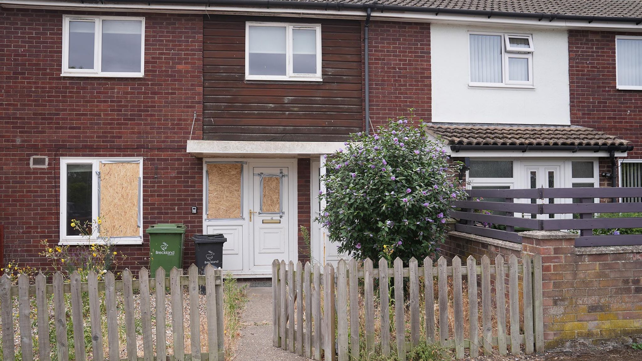 Protesters criticised by police for trying to kick down doors of properties believed to house asylum seekers