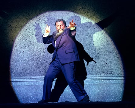 Paata Burchuladze strikes a dramatic pose as a spotlight centres on him