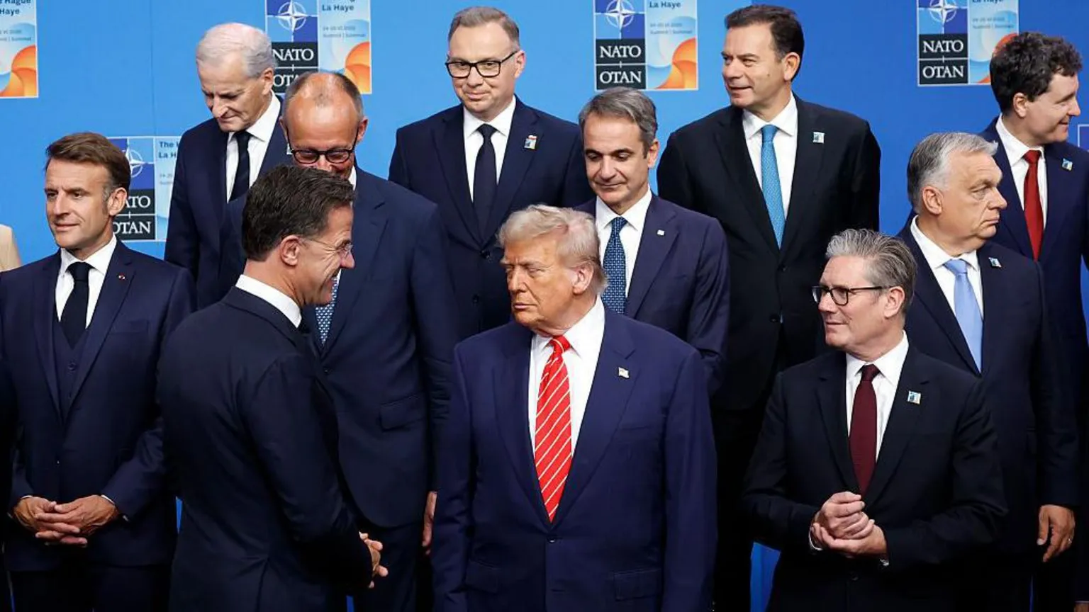 Getty Images Trump stands alongside Nato allies at a Nato event.