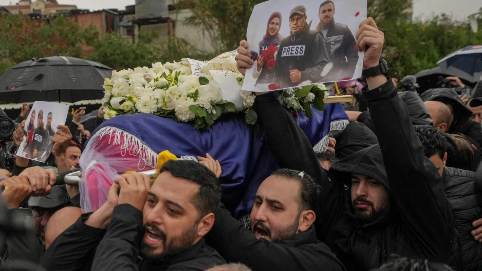 Relatives and friends carry the coffin of Mohammed Ftouni, during the funeral of Lebanese journalists, Al Mayadeen reporter Fatima Ftouni, cameraman Mohammed Ftouni and Al Manar reporter Ali Shaib, who were killed by a targeted Israeli strike, amid escalating hostilities between Israel and Hezbollah, as the U.S.-Israeli conflict with Iran continues, in Choueifat, Lebanon, March 29, 2026.