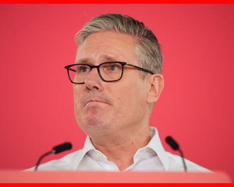 Head and shoulders shot of Starmer against red background