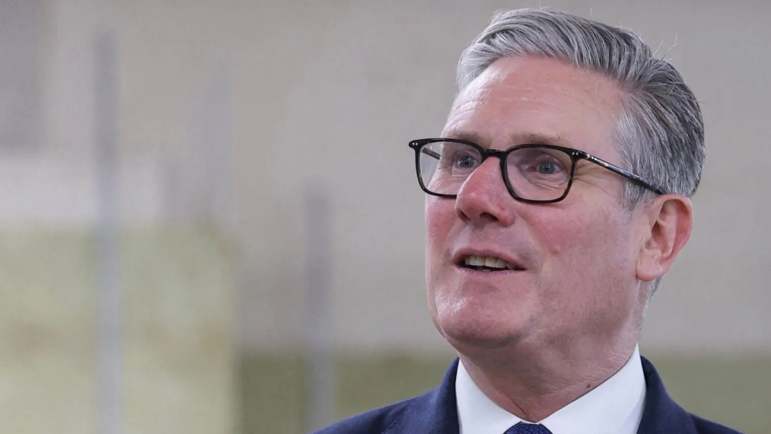 Keir Starmer wearing a navy suit