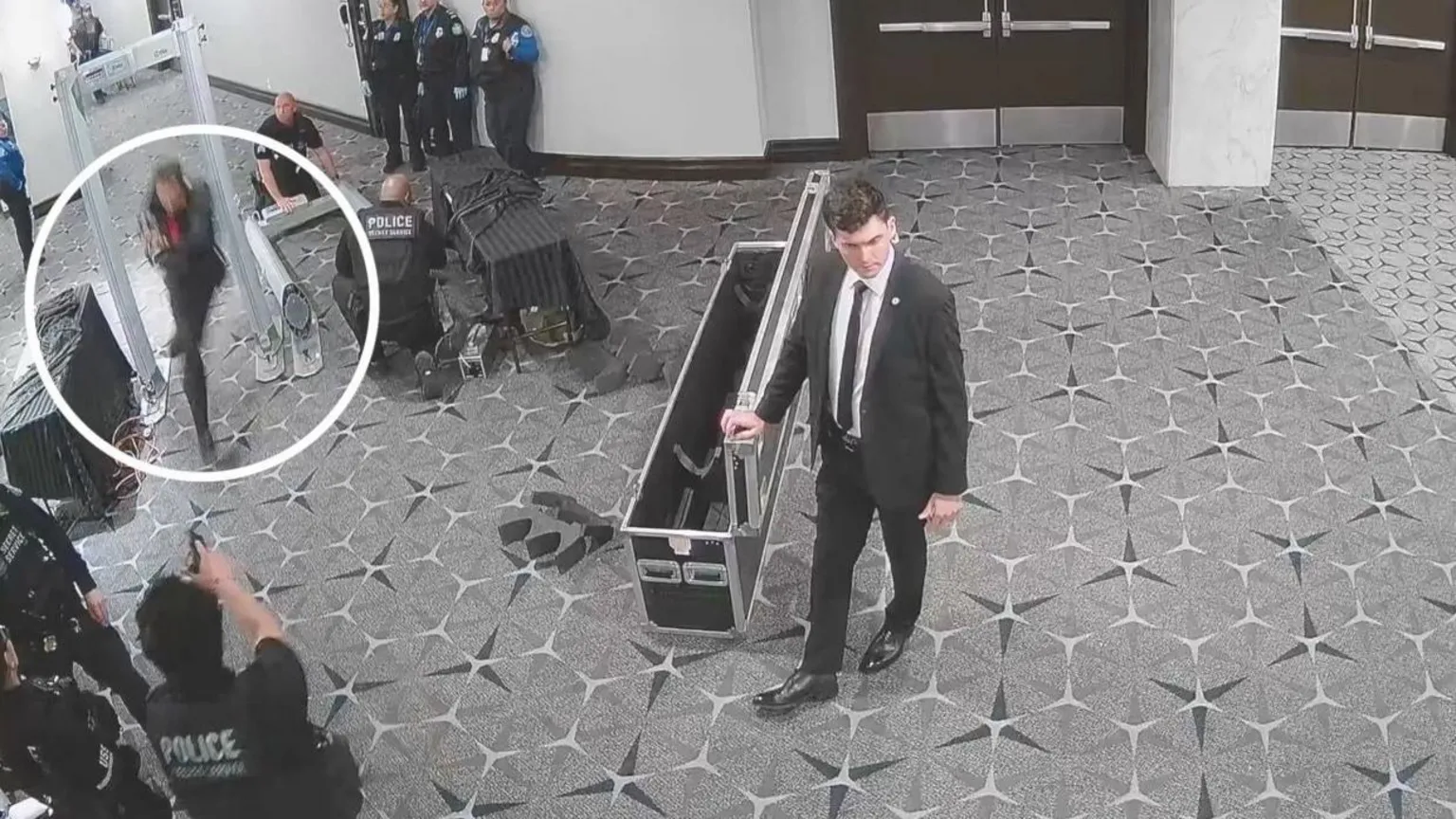 CCTV footage showing the WHCD suspect taking aim at a secret service member.