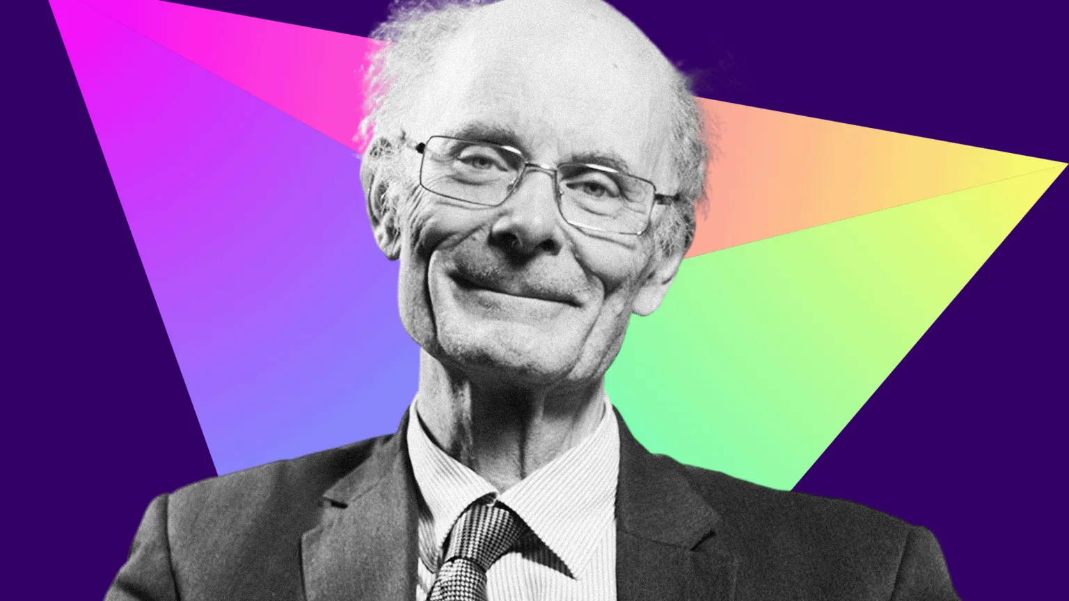 BBC Black and white photo of Prof Sir John Curtice who has a bald head with grey hair at the sides. He is wearing metal-rimmed glasses, a dark suit and tie and a light-coloured shirt. He is smiling at the camera. The background is a prism r triangle made up of different bright colours