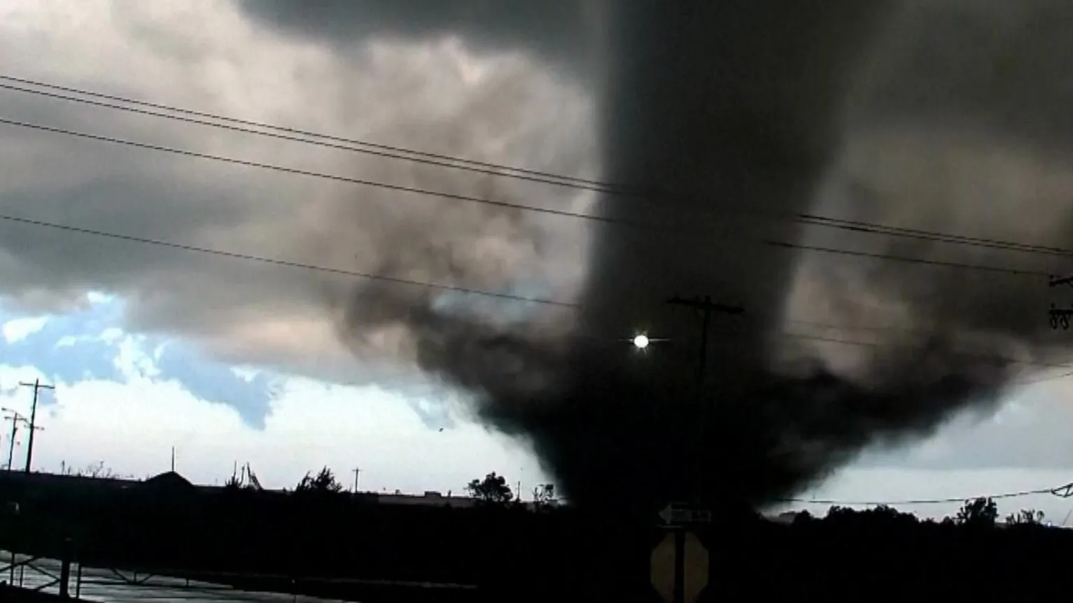 A large black swirl of air as tornado passes thorough Oklahoma