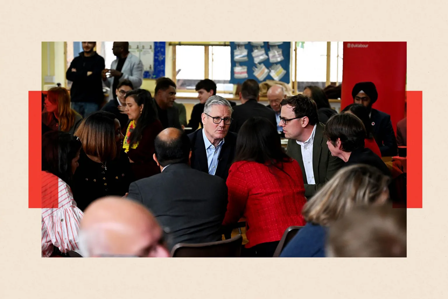 Getty Images Keir Starmer speaks to supporters and councillors following local elections at Kingsdown Methodist Church. The prime minister and those he is talking to are seated. There are around 15 people in shot.