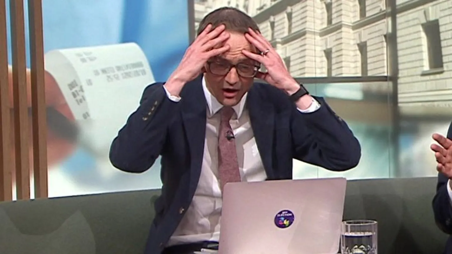 Chris Mason with his hands on his head