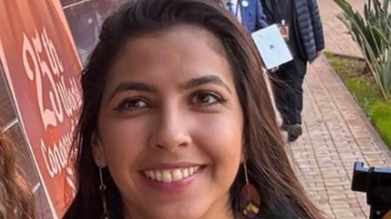 A woman - Vitoria Figueiredo Barreto - smiling straight at the camera.