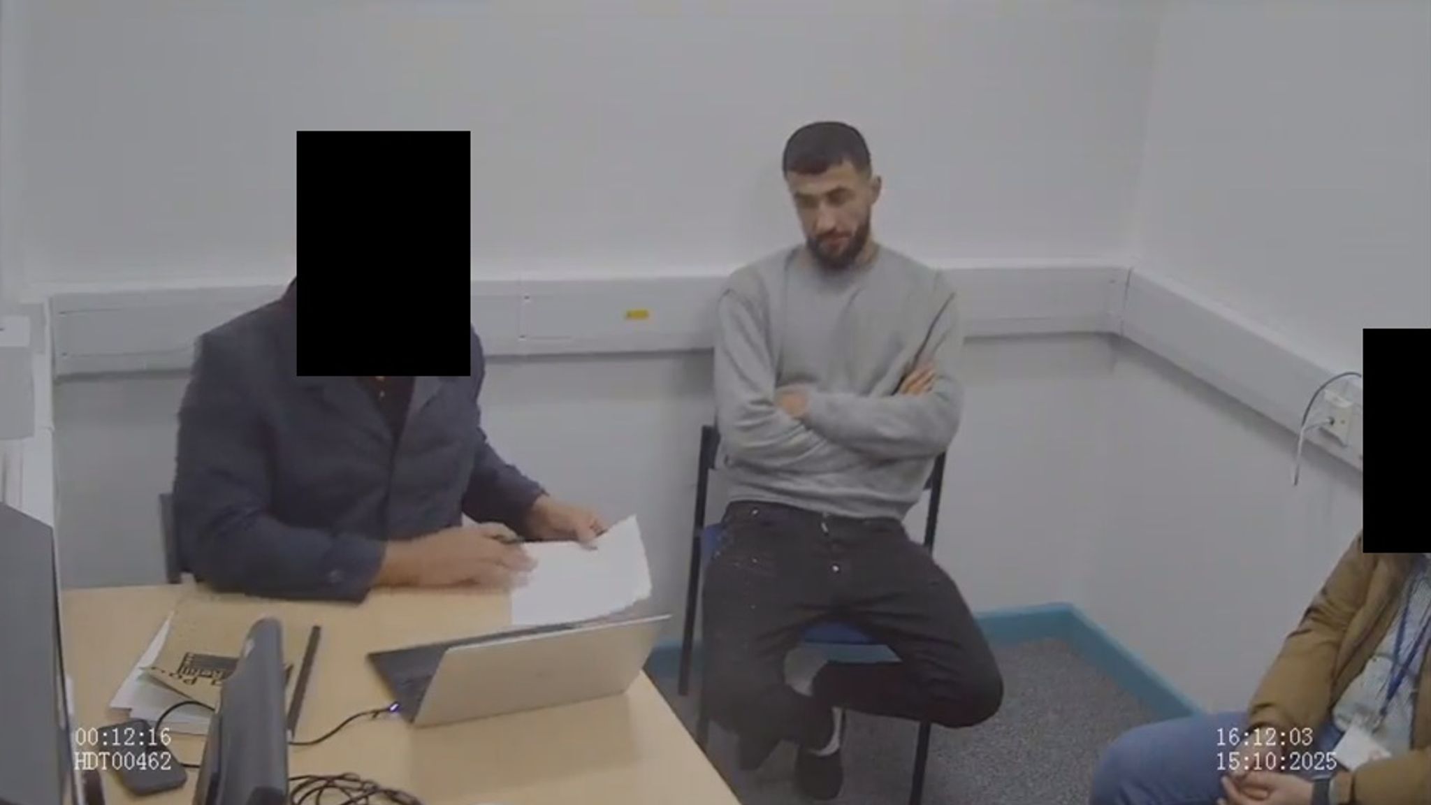 Abdulla Ahmadi being interviewed by police. Handout pic: Sussex Police