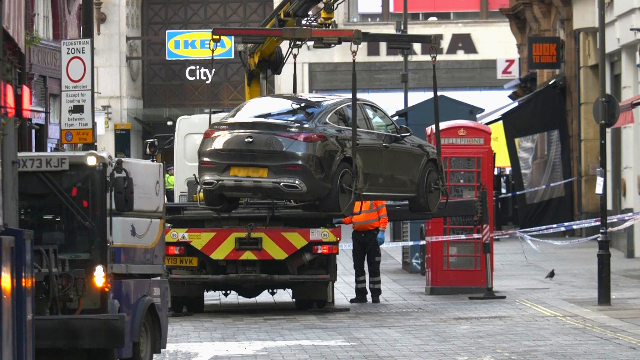 A car was later seen being removed from the scene