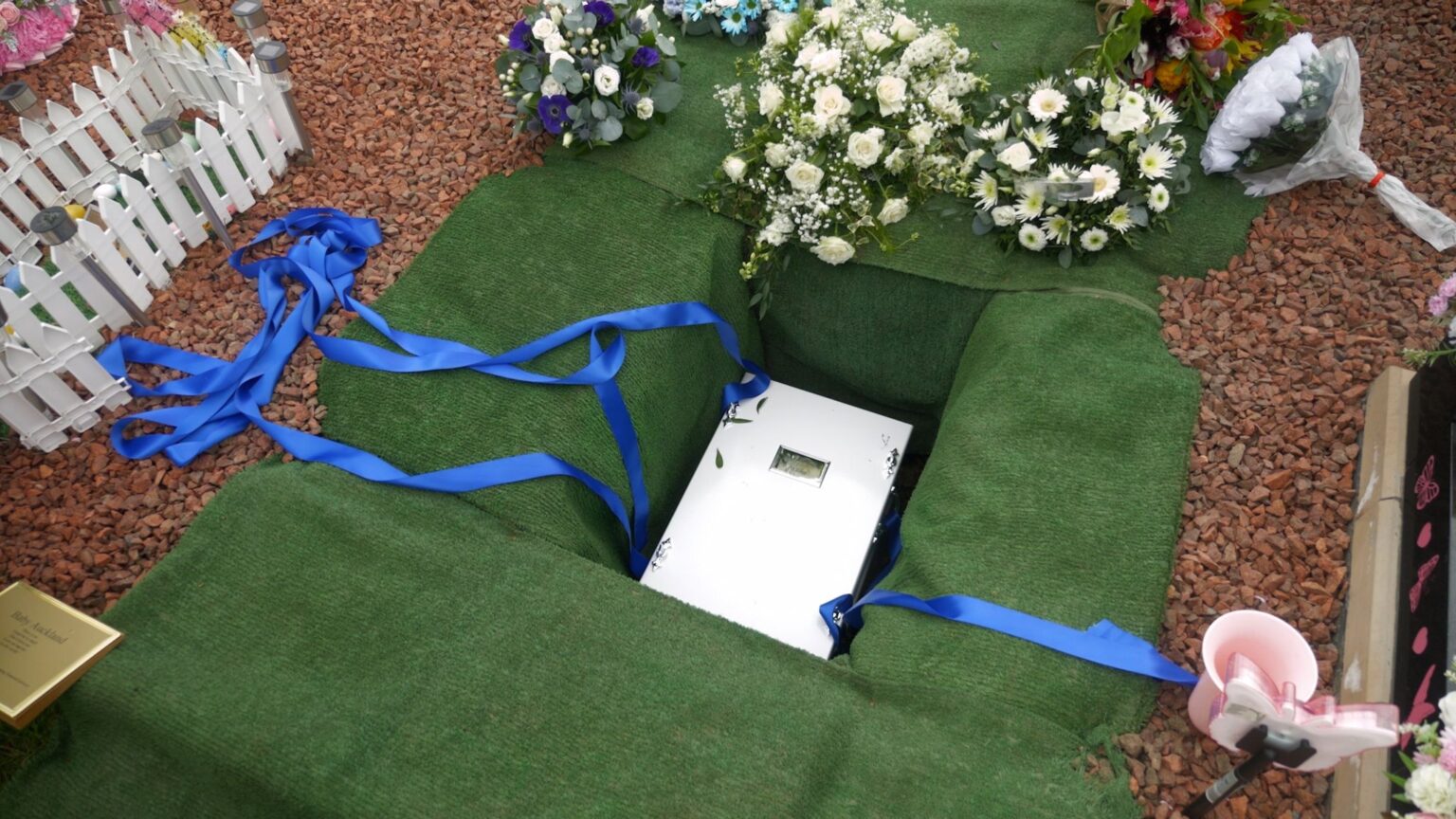Baby boy buried after body lay hidden for more than 100 years