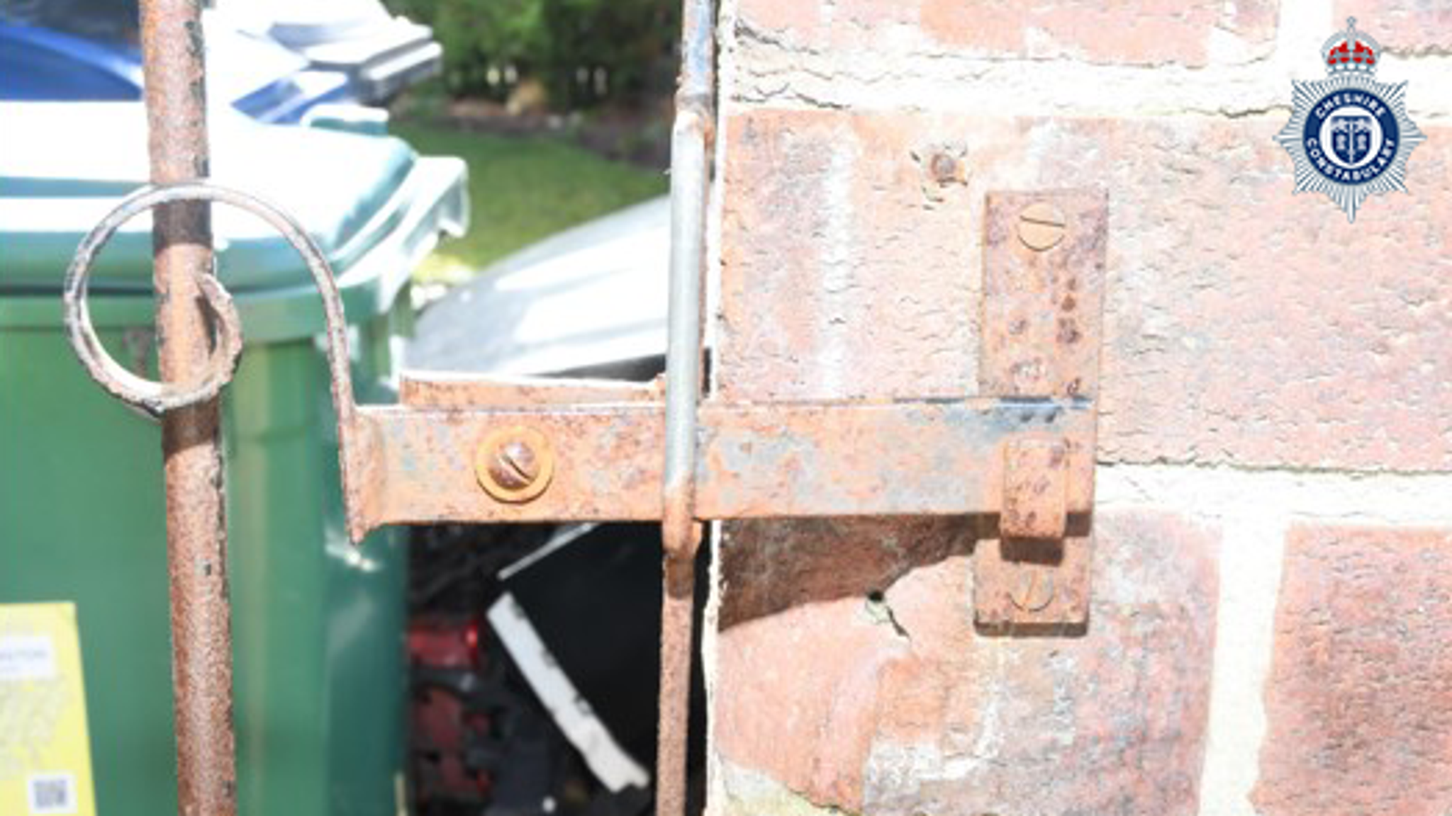 The latch securing a gate at Garner's home. Pic: Cheshire Police