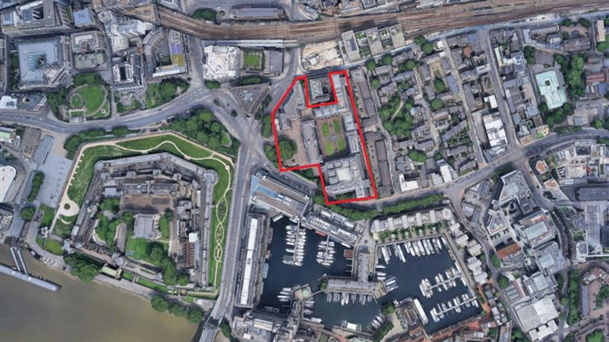 The flats are directly behind the new embassy (outlined in red), to the east. Pic: Google Earth