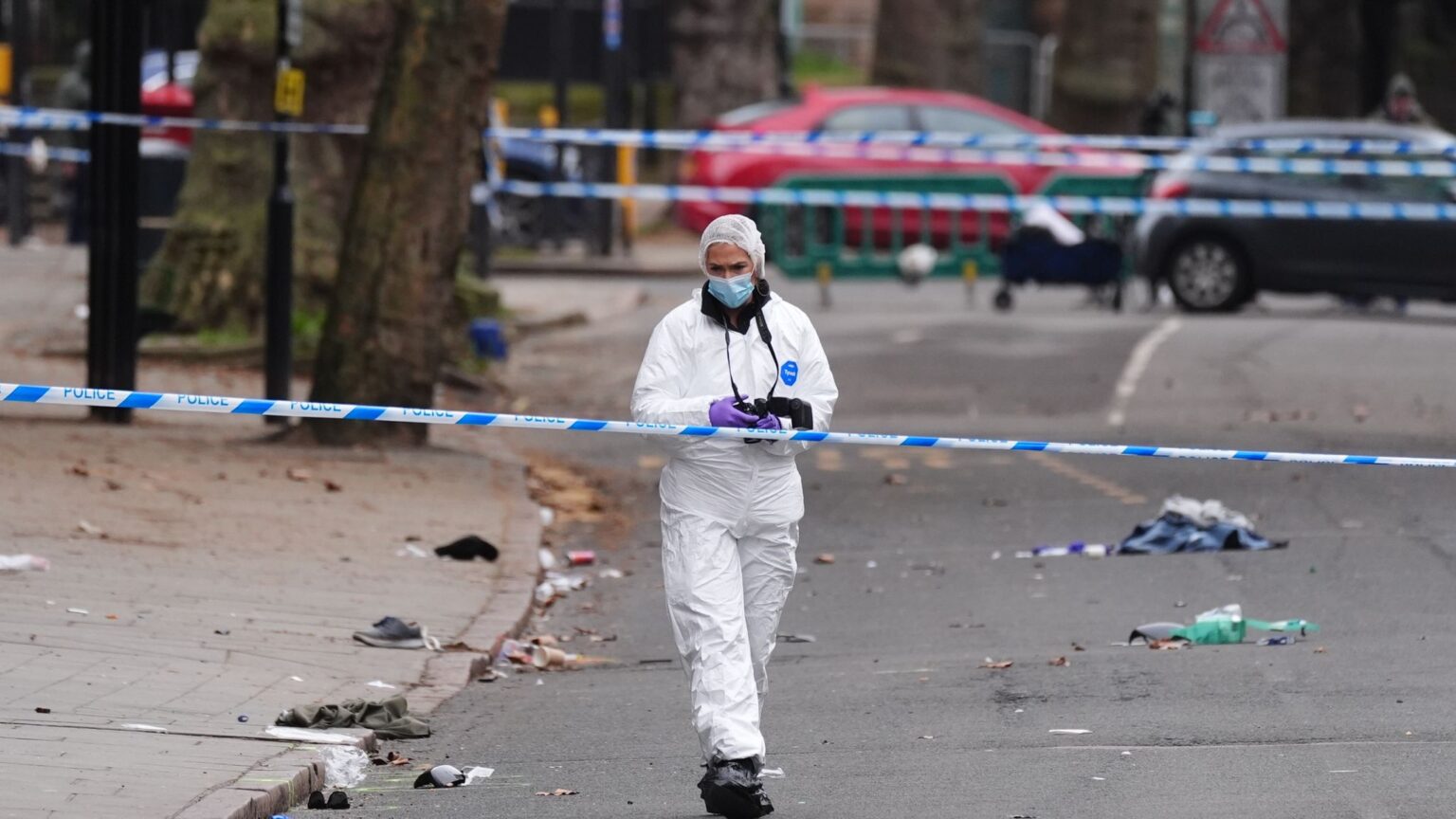 A forensic investigator at the scene of the collision. Pic: PA