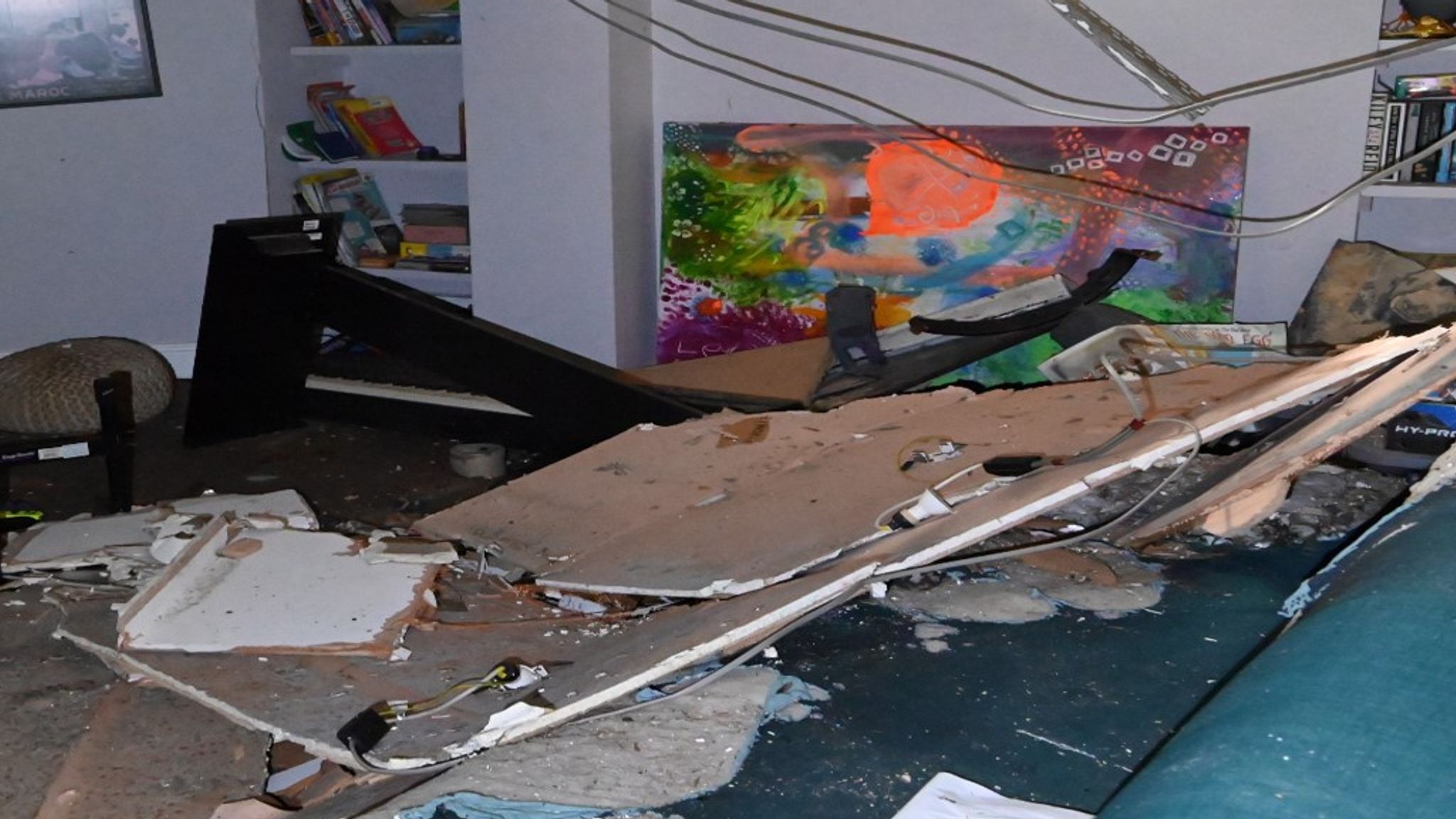 The ceiling partially collapses after the blast. Pic: CPS/PA