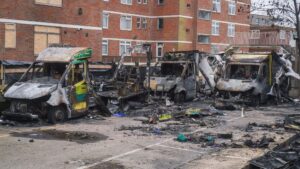 Fourth person charged over alleged arson on Jewish charity ambulances