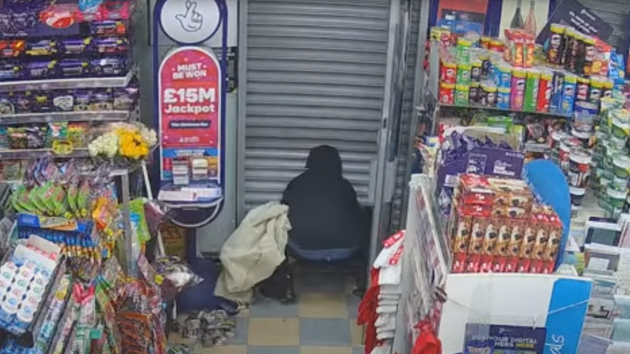 Peebles was seen trying to force himself out after the shutters came down. Pic: West Midlands Police