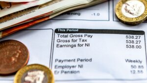 Surprise fall in unemployment rate but wage growth hits five-year low