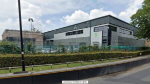 Three charged over arson attack on media group