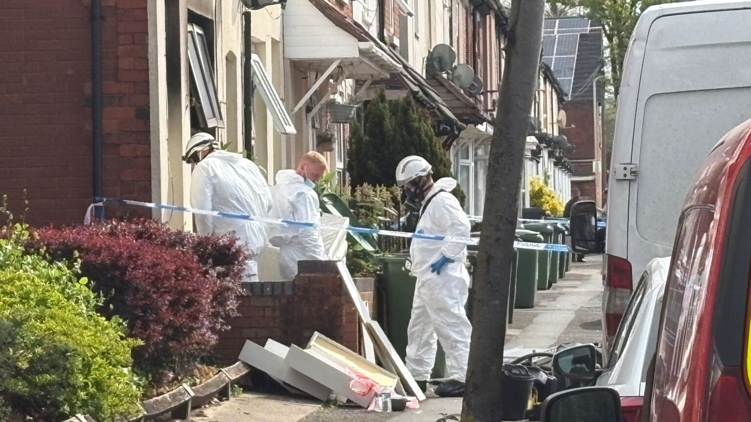 Woman arrested after two young children die in house fire